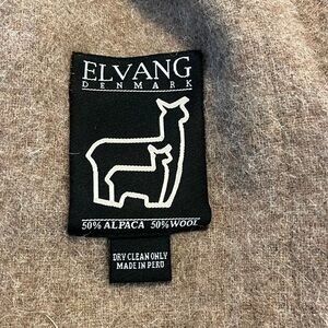Elvang Denmark 50% alpaca 50% wool made in Peru throw with fringe brown.